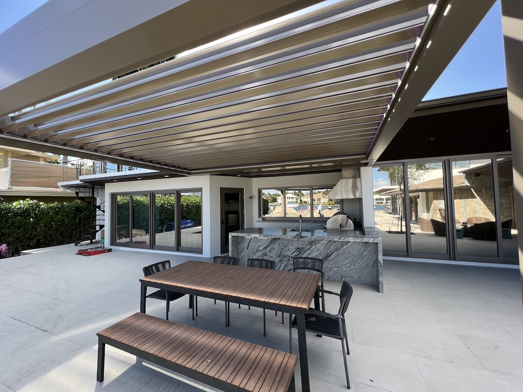 Beautiful backyard patio arranged for outdoor hosting 