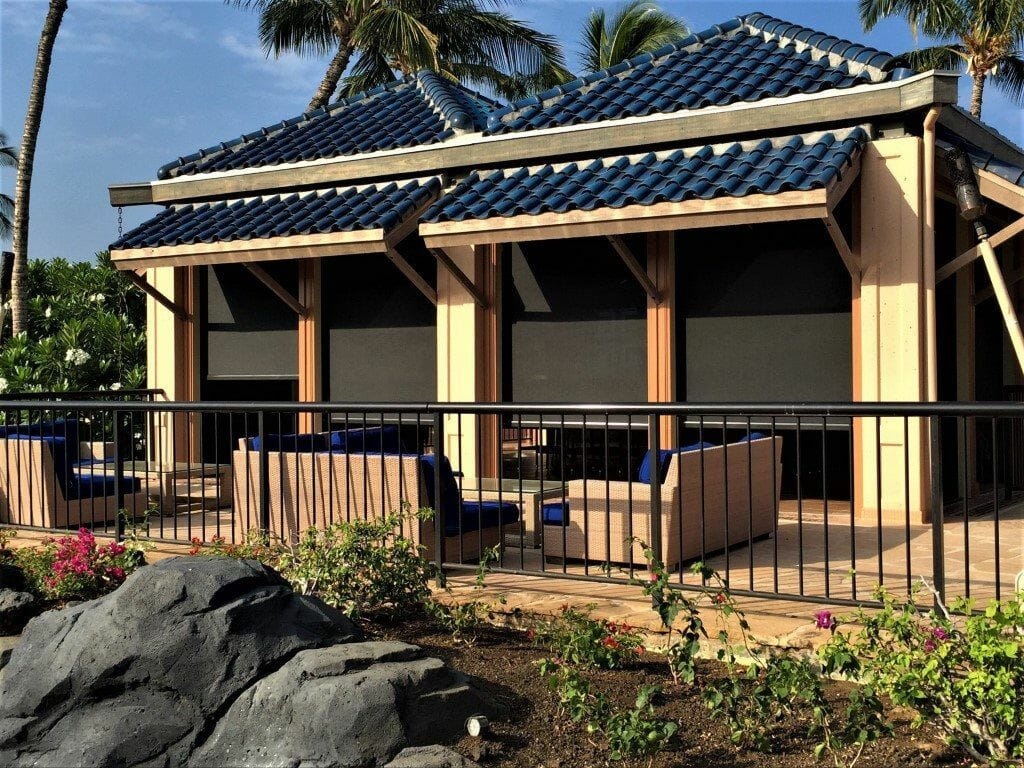 Exterior view of a home featuring professionally installed hurricane screens