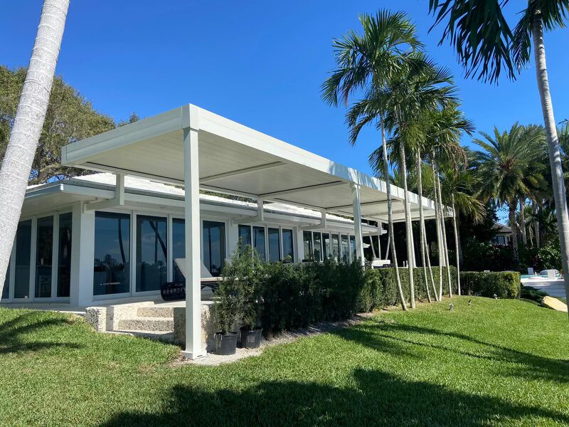 Modern garden with a stylish pergola providing shade over a seating area
