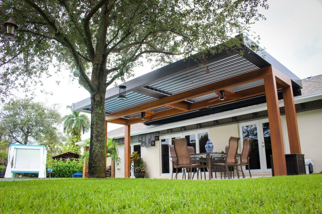 custom shade structure enhancing a luxury home's outdoor living area