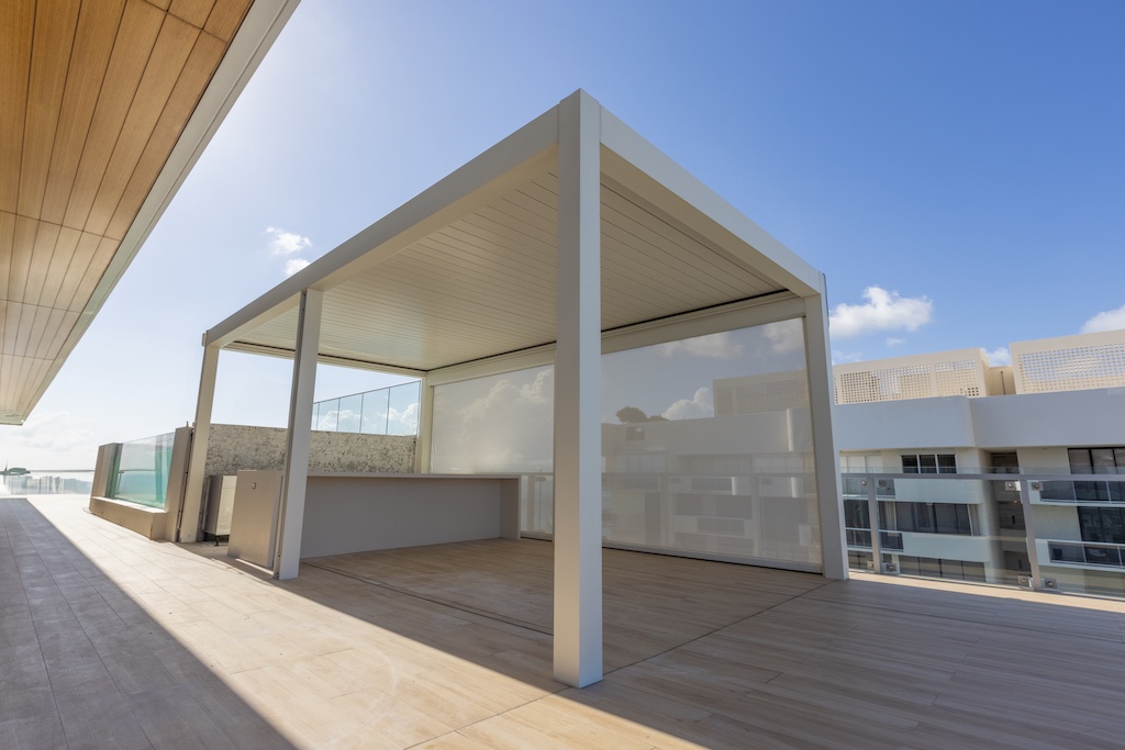 Designer pergola on a rooftop terrace creating an elevated outdoor living space