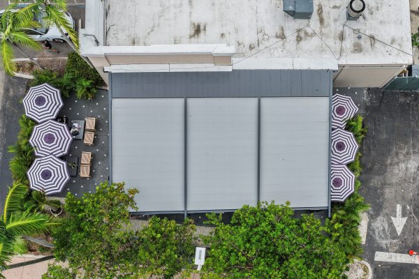 retractable fabric pergola over outdoor dining terrace