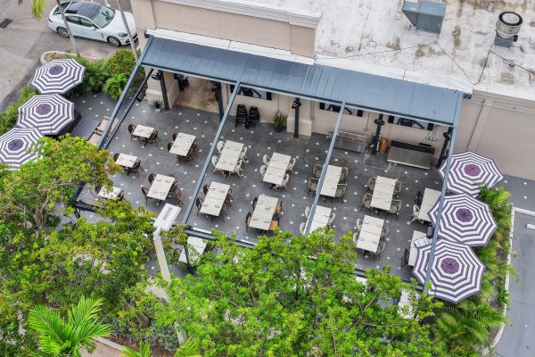 retractable fabric pergola over outdoor dining terrace