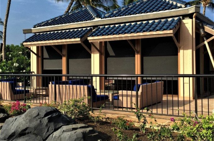 Hurricane screens protecting windows and doors from storm damage