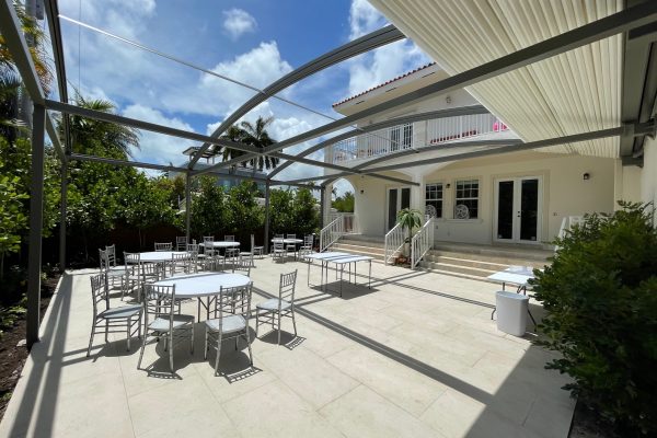 white fabric retractable canopy over outdoor terrace
