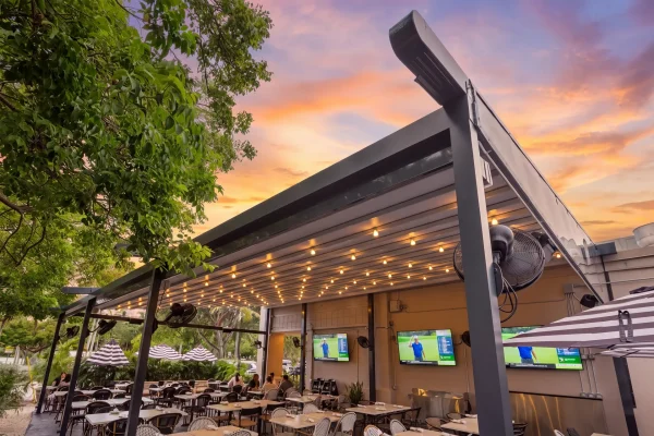 retractable fabric pergola over outdoor dining terrace