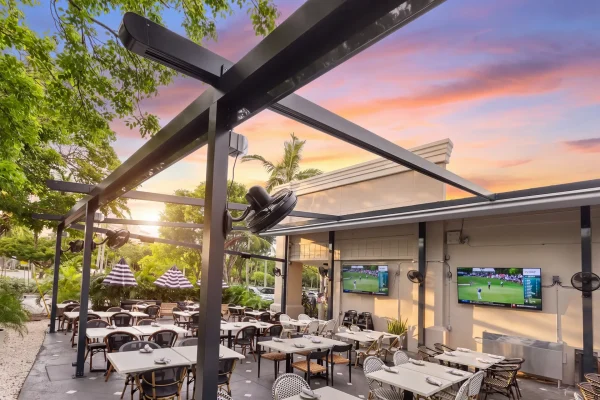 retractable fabric pergola over outdoor dining terrace