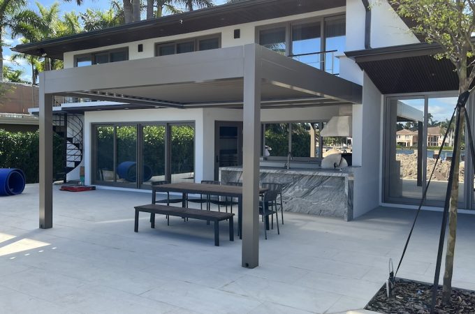 Louvered pergola with waterproof roof
